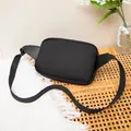 Minimalist solid black PU leather chest bag for women with adjustable strap and zipper - Black