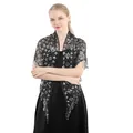 Detailed view of a black lace bridal shawl with silver sequins and fringe tassels - Black and Silver
