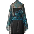 Detailed macro view of blue peacock embroidery and sparkling sequins on black mesh shawl - Black + Peacock Blue
