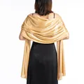 Back view of an elegant gold satin evening shawl draped over a formal black dress - Gold