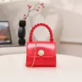 Vibrant red mini jelly handbag featuring a pearl fastener and elegant gold chain strap - Red