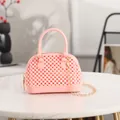 Mini pink jelly shell bag featuring a beaded texture and elegant gold chain strap - Pink