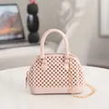 Fashionable pink jelly shell bag with unique pearl texture and elegant gold chain strap - Apricot