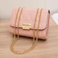 Pink triangle quilted crossbody bag with golden chain strap and elegant buckle - Pink