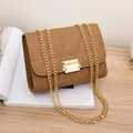 Brown fashion crossbody bag for women with triangular stitching and gold chain strap - Coffee