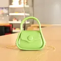 Mini sac à main vert citron en gelée avec poignée et une bandoulière chaîne or - Vert
