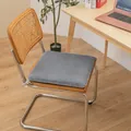 Detail view of a square gray plush chair cushion on a rattan chair in an office - Rabbit Plush Style / 40x40cm Standard Type / Silver Gray