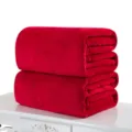 Two layers of soft red flannel plush blankets folded on a white decorative table - 50x70cm (Pet Blanket) / Red