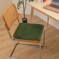 Detail view showing the soft texture of a plush green heating chair cushion on a wooden chair - Rabbit Plush Style / 40x40cm Standard Type / Army Green