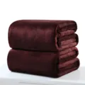 Set of two soft solid burgundy red flannel blankets neatly folded for double bed - 70x100cm / Coffee