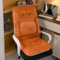 Detail view of orange bean velvet integrated chair cushion with soft textured dots. - Integrated Backrest Style / 45x45x55cm / Orange Red