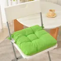 Detailed view of a thickened green cloth chair cushion with secure straps on a white folding chair - 40*40cm / Candy Green