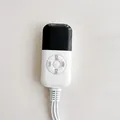 Close-up of the digital controller for the office electric heating seat cushion. - 1 Dual Control + 2 Heating Pads
