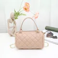 Elegant minimalist beige quilted pillow handbag with golden chain strap and top handle - Khaki