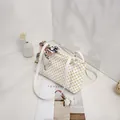 Elegant white printed handbag with yellow geometric pattern and decorative silk scarf - White