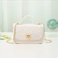Elegant white quilted small square handbag with gold chain strap and lock closure - White