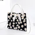 Stylish floral daisy print handbag with white bow and contrast handles - Daisy Print With Bow / Black
