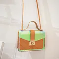 Trendy iridescent transparent crossbody bag with brown quilted inner pouch and gold lock - Yellow