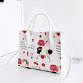 Chic white crossbody handbag with colorful cartoon graffiti and red heart prints - Cartoon Print / White