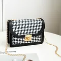 Stylish black and white houndstooth small square bag with gold-tone chain and lock detail - Black