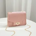 Fashionable pink stone-patterned chain crossbody bag with elegant gold lock closure - Pink