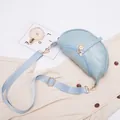 Elegant light blue stone pattern saddle bag featuring an adjustable fabric strap - Blue