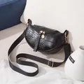 Elegant black stone pattern PU leather saddle bag with gold-toned hardware detail - Black