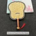 Hand-woven natural straw fan in banana shape with deep blue border and red tassel - Banana shape (dark blue edge