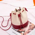 Minimalist color-block drawstring bucket bag in cream and red faux leather - Drawstring Bucket / Red