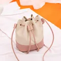 Stylish quilted color-block bucket bag with drawstring closure in pink and cream - Drawstring Bucket / Pink