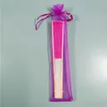 Rose pink silk folding fan with bamboo ribs stored in a purple organza drawstring bag - Rose Red
