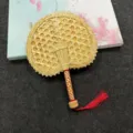 Handwoven natural cattail leaf fan in apple shape with red tassel - Apple shape (original color edging