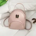 Stylish pink mini backpack for women featuring cute bunny ear metal hardware decoration - Pink