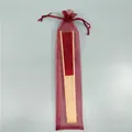 Elegant 21cm burgundy silk folding fan with bamboo ribs in matching organza gift bag - Burgundy