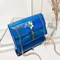 Stylish blue holographic laser crossbody bag with gold chain and flower tassel detail - Blue