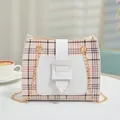 Elegant plaid crossbody bag for women with gold chain strap and white colorblock detail - White