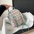 Small plaid crossbody backpack featuring blue trim and a stylish color-block design - Blue