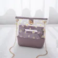 Transparent daisy print chain bag with purple inner pouch and gold turn-lock - Transparent Printed 2-in-1 Bag (L189) / Purple