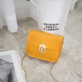 Stylish yellow stone pattern small square bag with gold chain strap and metal lock closure - Yellow
