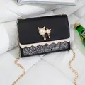 Elegant black small square crossbody bag featuring gold chain and cute cat pearl ornament - Black (Sequined)