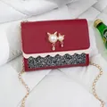 Elegant red mini chain shoulder bag featuring cute cat pearl decoration and glitter finish - Red (Sequined)