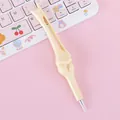 Bolígrafo creativo con forma de hueso en color beige con tinta negra para regalo - Estilo de Hueso C / Blanco Roto