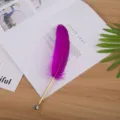 Creative magenta feather ballpoint pen with a gold barrel and silver gradient tip detail - Light Purple