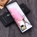 Elegantes rosa Straußenfeder-Schreibset mit Tintenflasche in einer schwarzen Box - Flamingo Rosa
