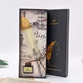 Vue détaillée d'un coffret cadeau luxe stylo plume avec encre et cinq plumes métal - Ivoire