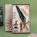 Set di penne a piuma vintage steampunk con timbro in ceralacca e pennini in box - Nero