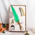 Detailed view of vintage green quill pen gift set with ink, nibs and wax seal - Green