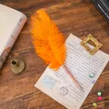 Elegante bolígrafo de pluma de avestruz naranja con cuerpo de metal en oro rosa - Naranja
