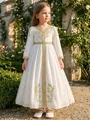 Full view of girl's white long ethnic dress with elegant golden embroidery in a garden - 4-5Y / Dresses / White