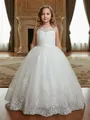 Detail showing elegant lace applique patterns and layered tulle skirt on a girls dress. - 4Y / Dresses / White